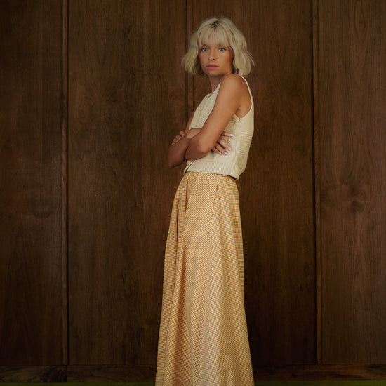 Side profile of the full-length Rosemary Skirt in CandyCorn gingham.